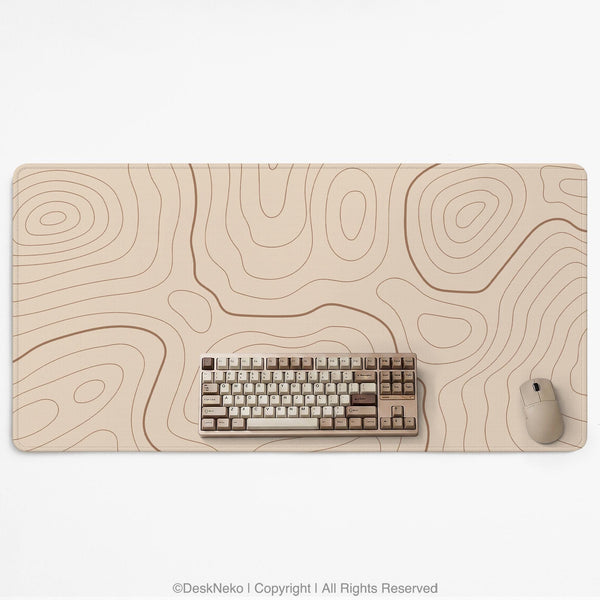 A beige mousepad with a topographic line pattern in a repeating design.