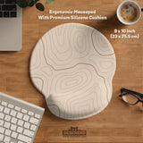 A beige mousepad with a topographic line pattern in a repeating design.