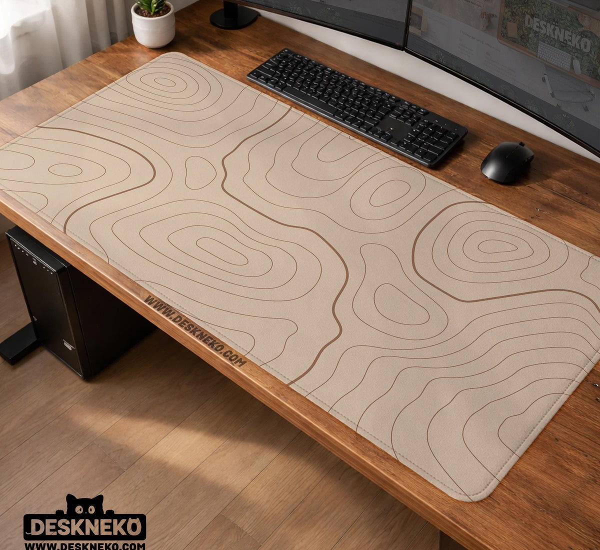 A beige mousepad with a topographic line pattern in a repeating design.