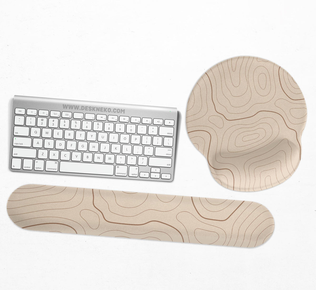 Beige mousepad and keyboard wrist rest with a topographic line pattern shown in a neutral desk setup.