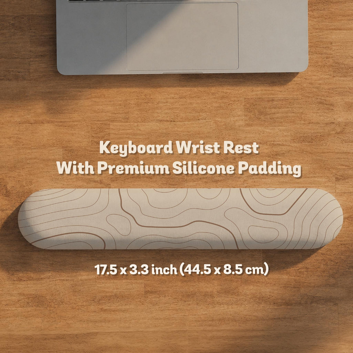Beige mousepad and keyboard wrist rest with a topographic line pattern shown in a neutral desk setup.