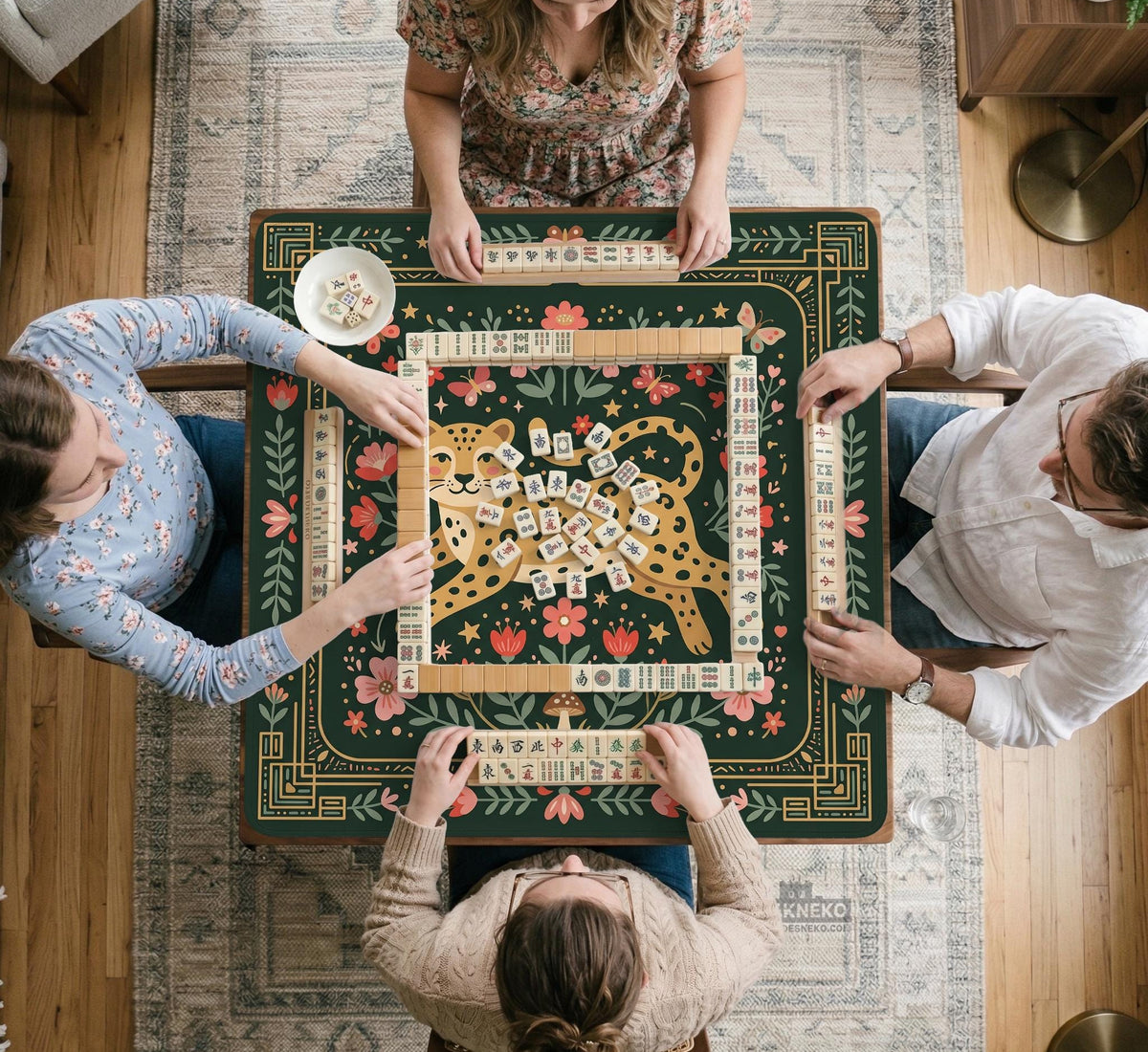 Dark green square mahjong mat with a golden spotted leopard in the center, surrounded by flowers, leafy stems, butterflies, and small star accents.