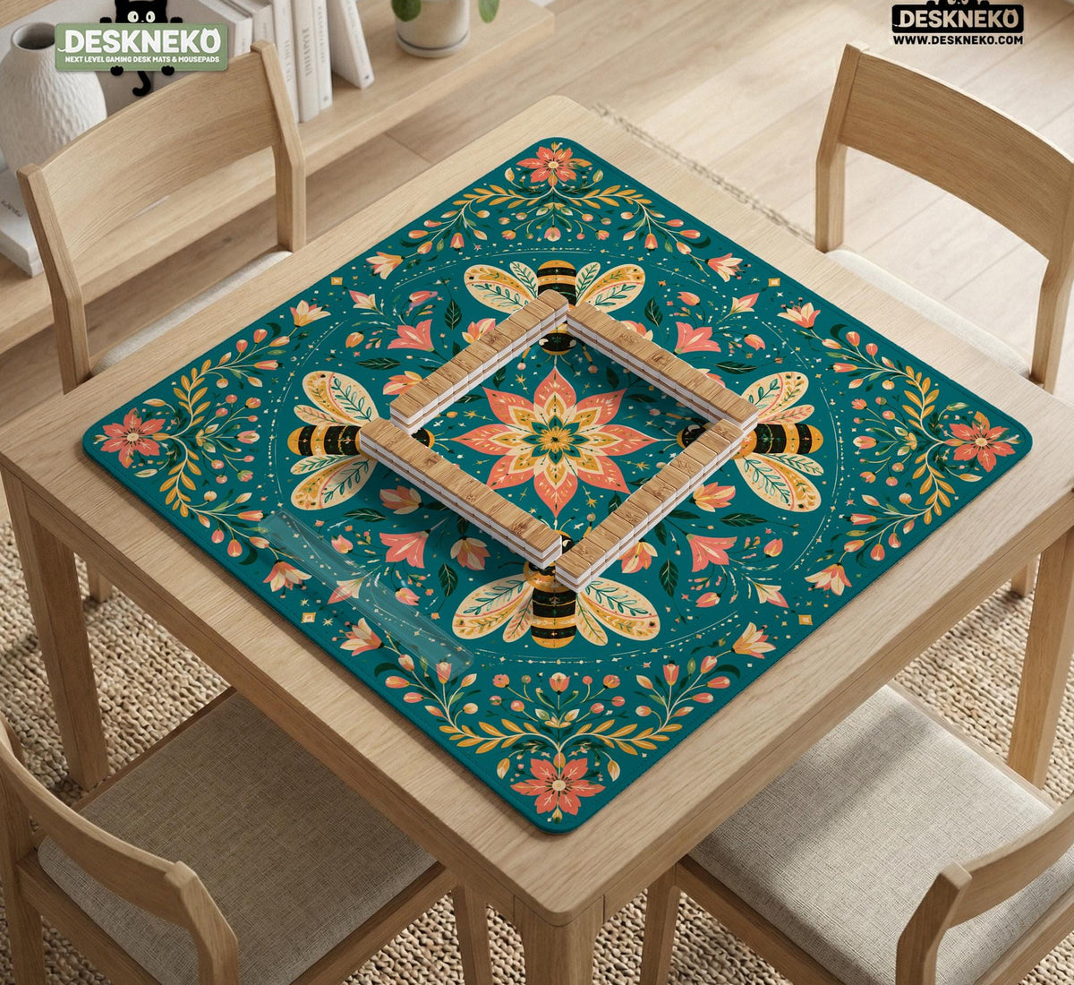 Green mahjong mat with a botanical bee and floral mandala design in teal, coral, cream, and gold.