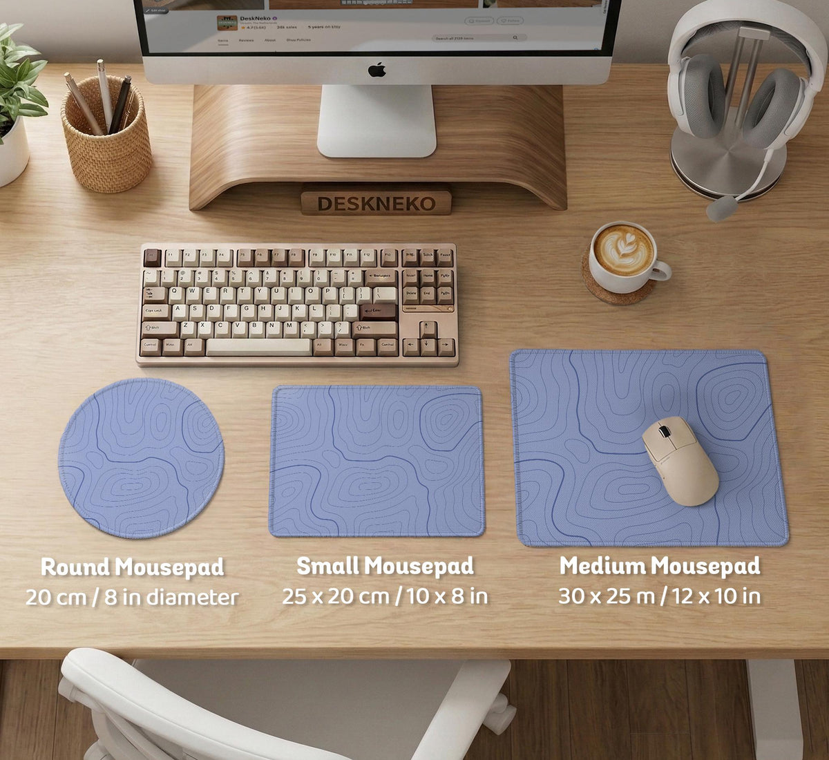 A periwinkle deskmat with thin blue contour lines printed across the surface.