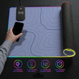 A periwinkle deskmat with thin blue contour lines printed across the surface.