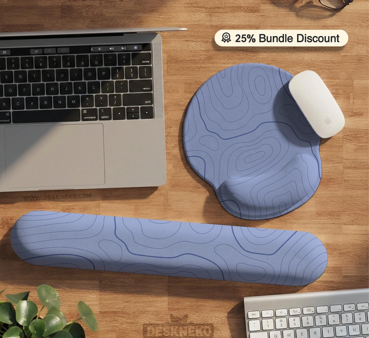 A periwinkle deskmat with thin blue contour lines printed across the surface.