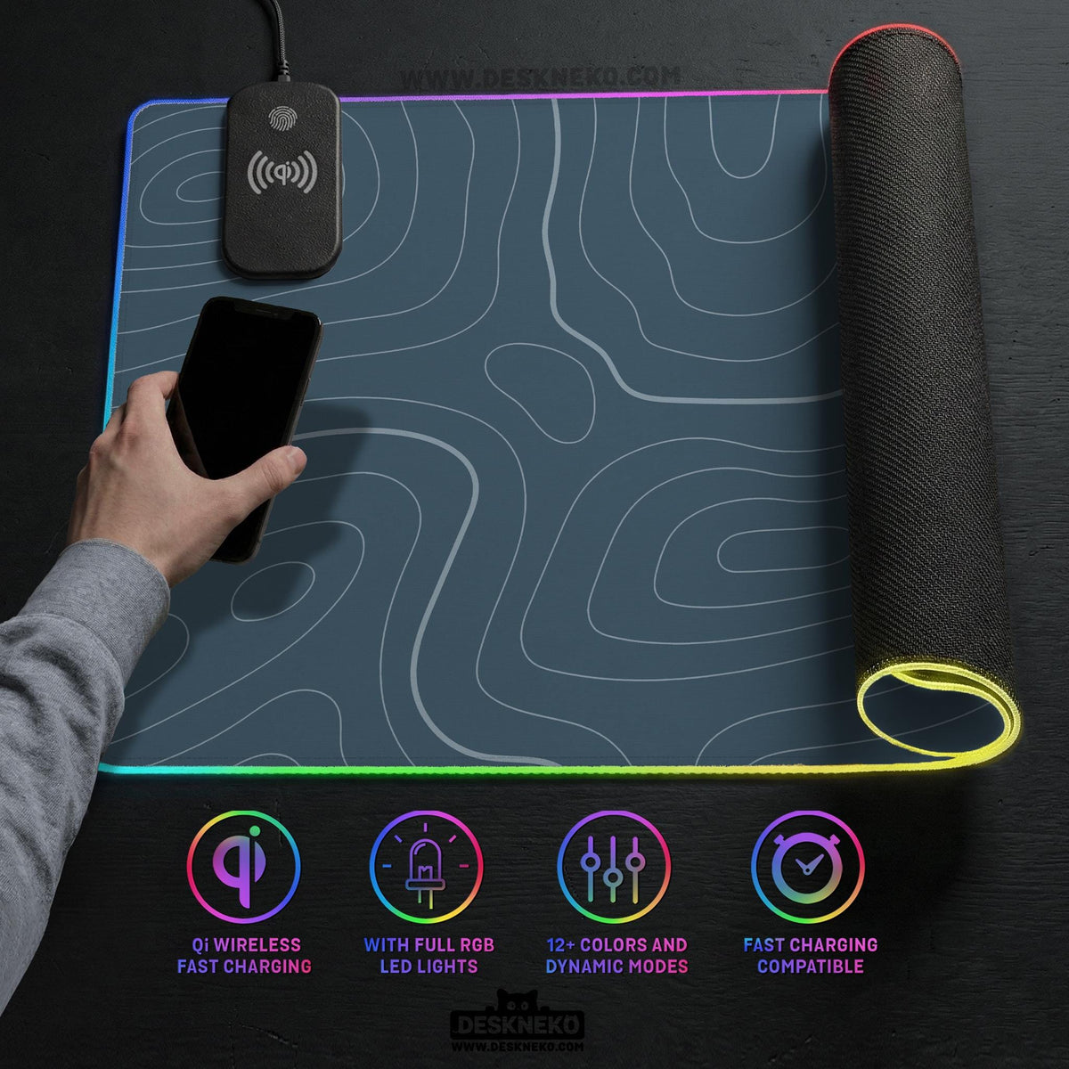 A slate blue desk mat with thin contour line map art on a light background.