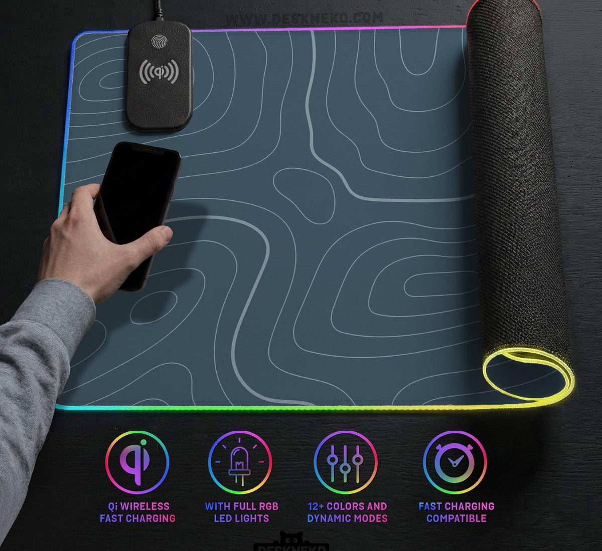 Blue mousepad with a topographic line pattern on a slate background.