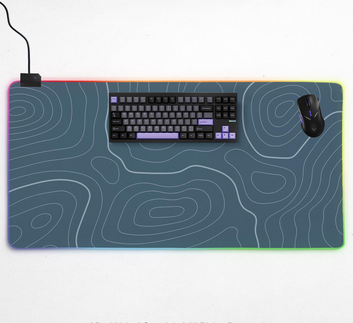 Blue mousepad with a topographic line pattern on a slate background.