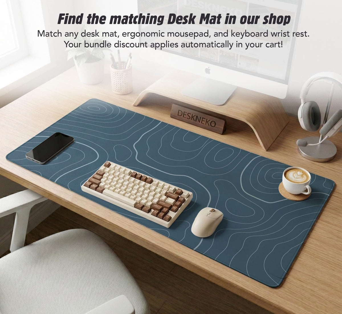 Muted blue desk mat with thin topographic line art pattern shown with matching mousepad and keyboard wrist rest options.