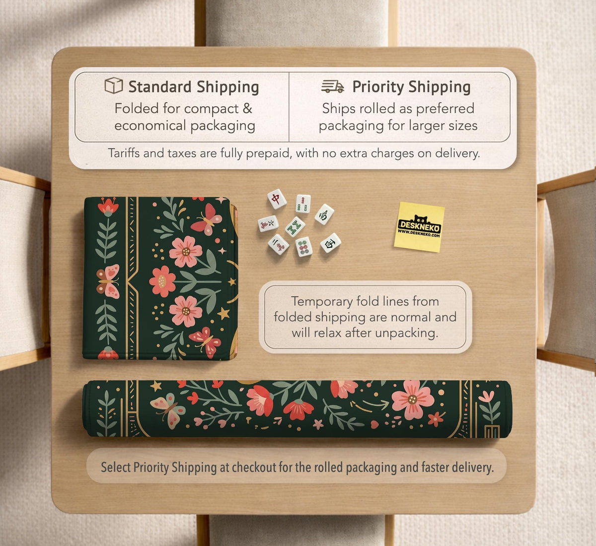 Dark green square mahjong mat with floral branches, small red blossoms, gold line details, and a large moth in the center.