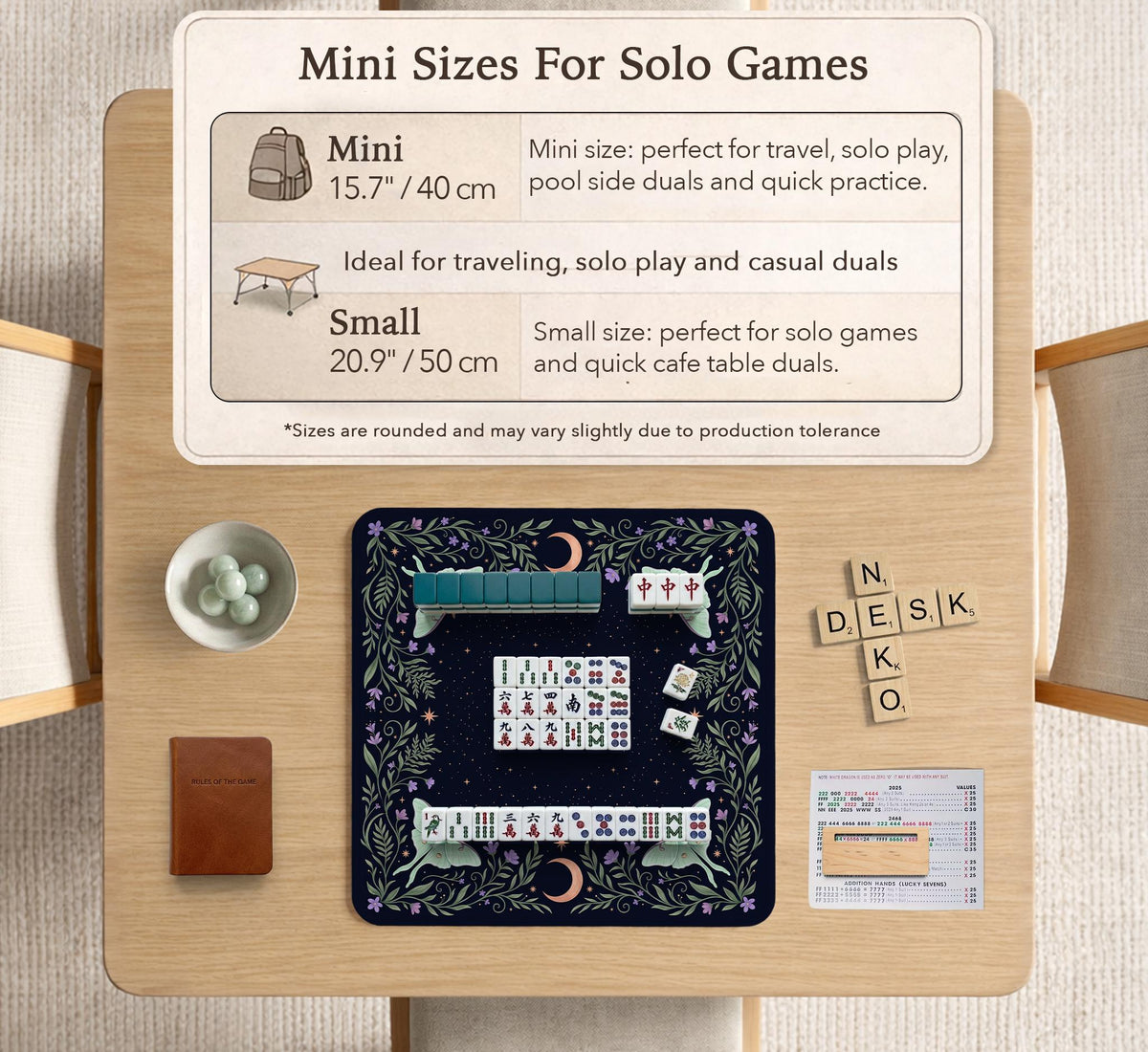 Navy square mahjong mat with a floral border, copper moons, scattered stars, pale moths, and leafy botanical details.