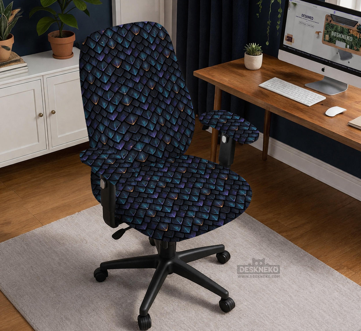 An indigo desk chair cover with a dragon scale pattern in blue, navy, purple, and copper tones, shown as a stretch slipcover with coverage options.