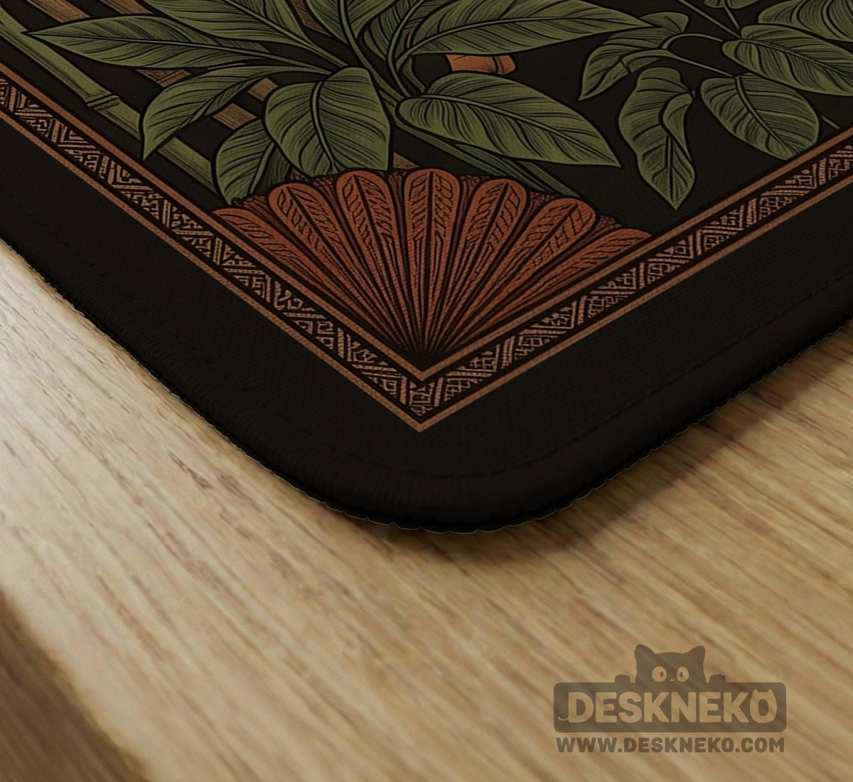 Black square mahjong mat with mirrored tiger faces, bamboo, dark tropical leaves, ornate border details, and orange accents.