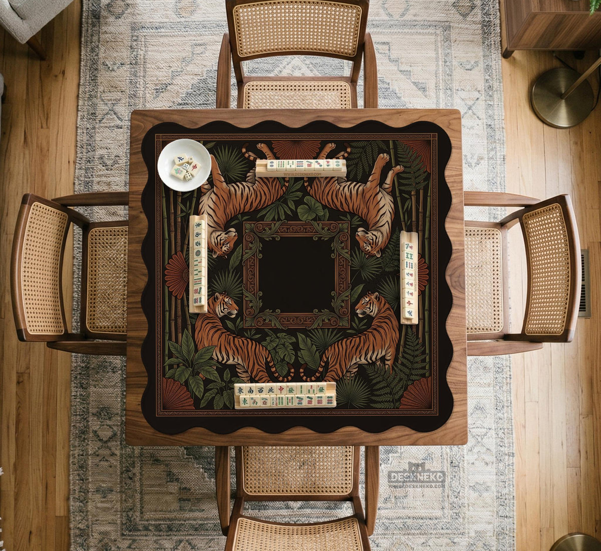 Black square mahjong mat with mirrored tiger faces, bamboo, dark tropical leaves, ornate border details, and orange accents.