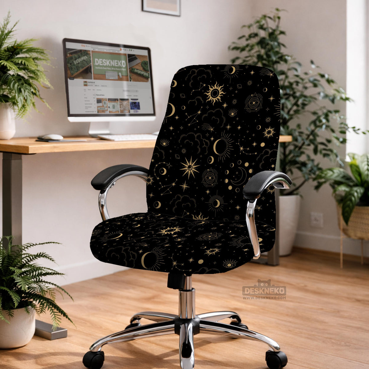 Black chair cover with a gold astrology print of moons, suns, stars, and symbols on a gaming chair.