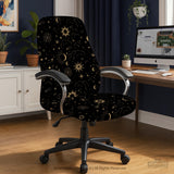 Black chair cover with gold moons, suns, stars, constellations, and line art printed across the fabric.