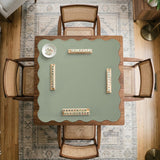 A plain light sage green square mahjong mat with a smooth solid-color surface.