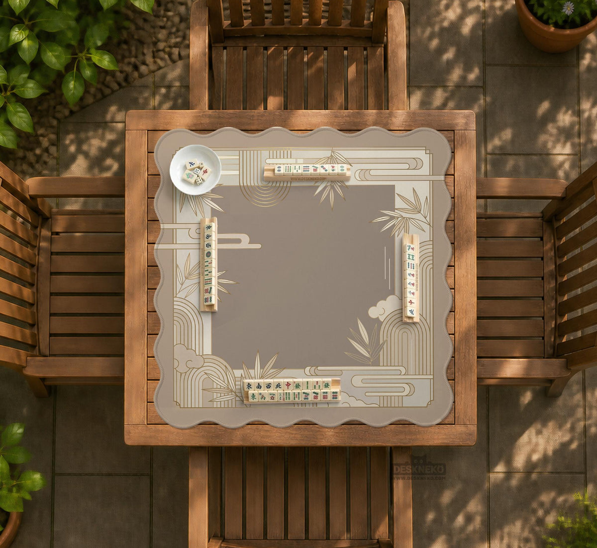 Beige and gold square mahjong mat with a bamboo pattern and geometric border.