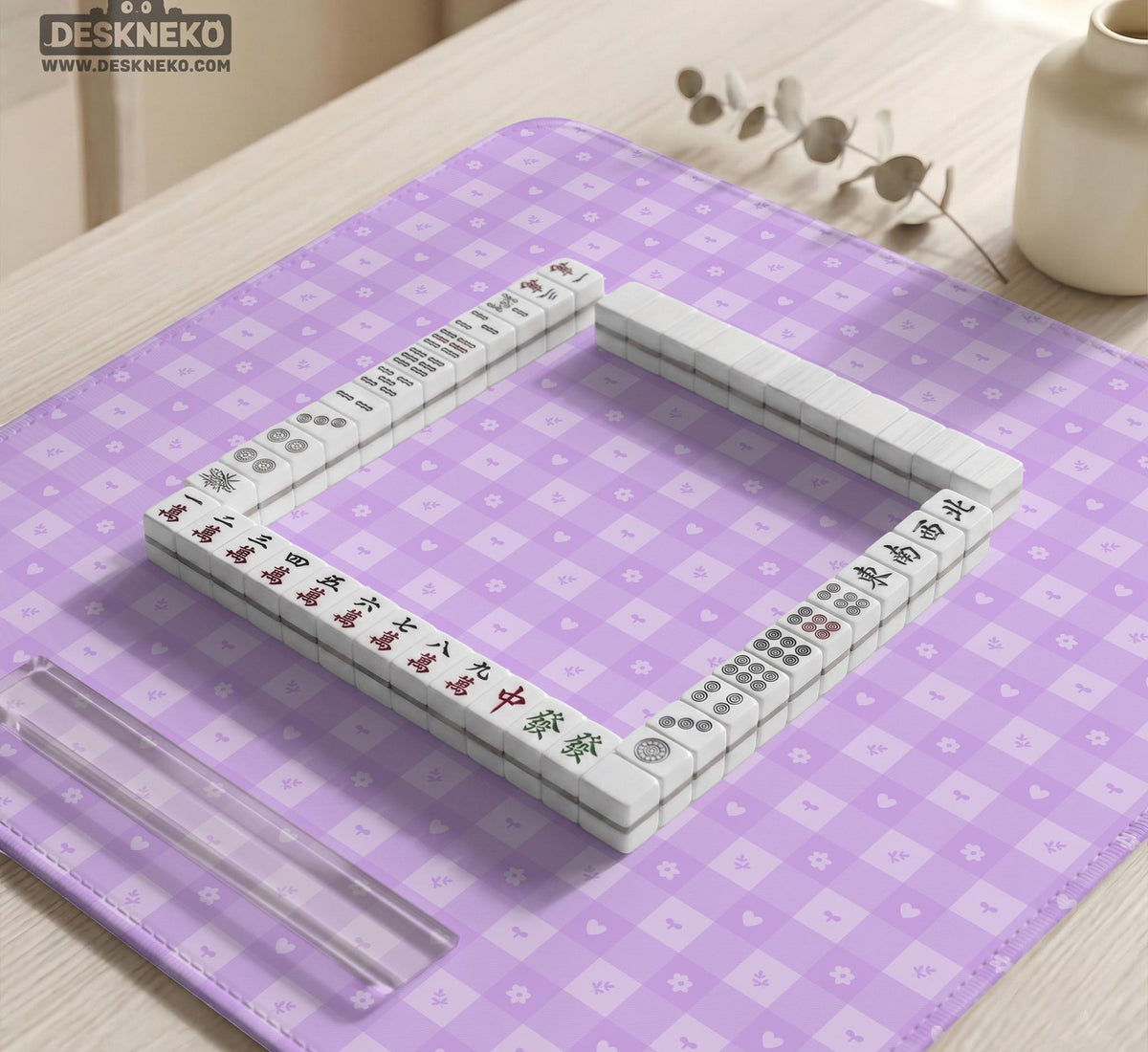 Lavender gingham mahjong mat with a scalloped edge and a pastel check pattern.
