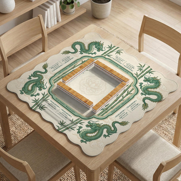 Sage green mahjong mat with a bamboo pattern, dragon design, printed rules around the edge, and a scalloped edge option.