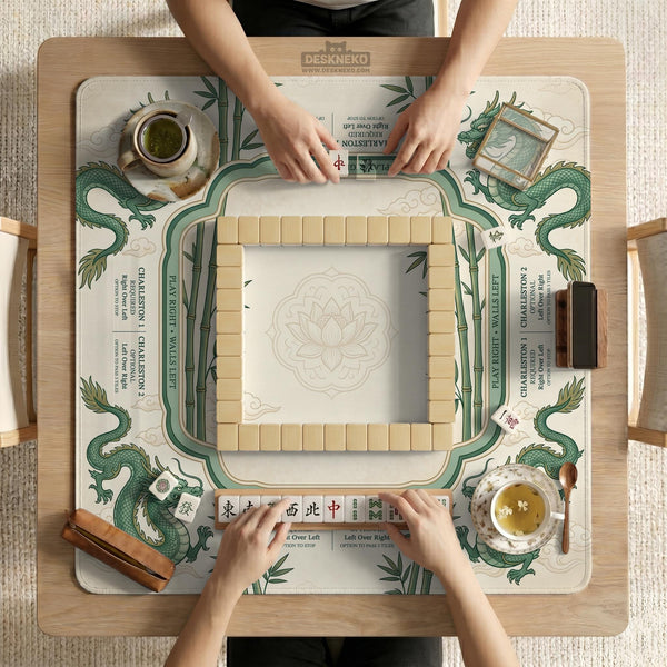 Sage green mahjong mat with a bamboo pattern, dragon design, printed rules around the edge, and a scalloped edge option.