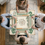 Sage green mahjong mat with a bamboo pattern, dragon design, printed rules around the edge, and a scalloped edge option.