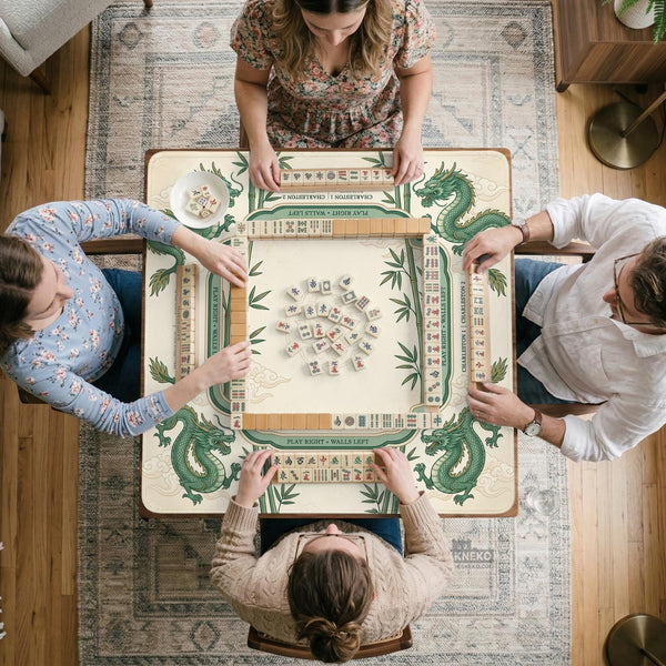 Sage green mahjong mat with a bamboo pattern, dragon design, printed rules around the edge, and a scalloped edge option.