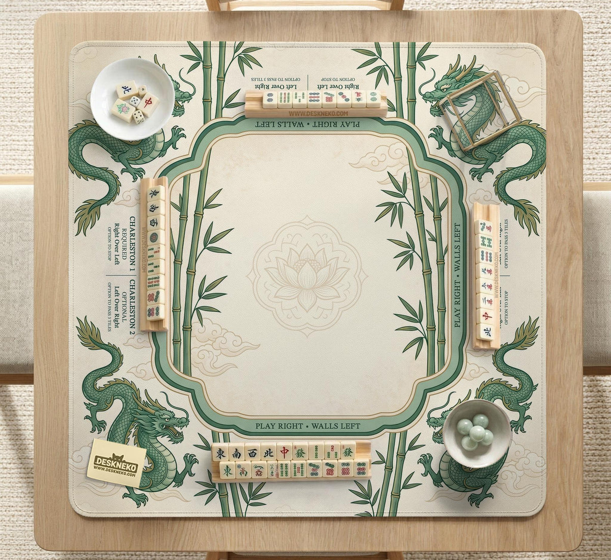 Sage green mahjong mat with a bamboo pattern, dragon design, printed rules around the edge, and a scalloped edge option.