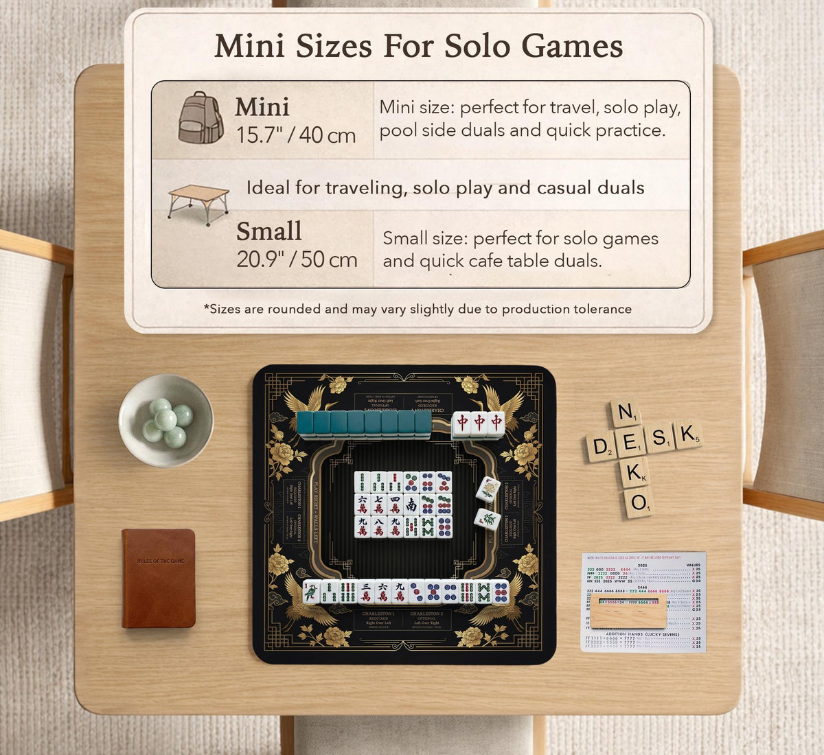 Black and gold square mahjong mat with an art deco crane and floral border, rule reminders around the edges, and a blank center area.