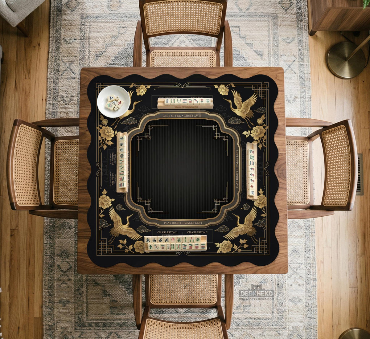 Black and gold square mahjong mat with an art deco crane and floral border, rule reminders around the edges, and a blank center area.