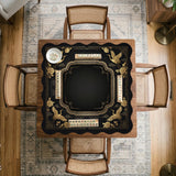 Black and gold square mahjong mat with an art deco crane and floral border, rule reminders around the edges, and a blank center area.
