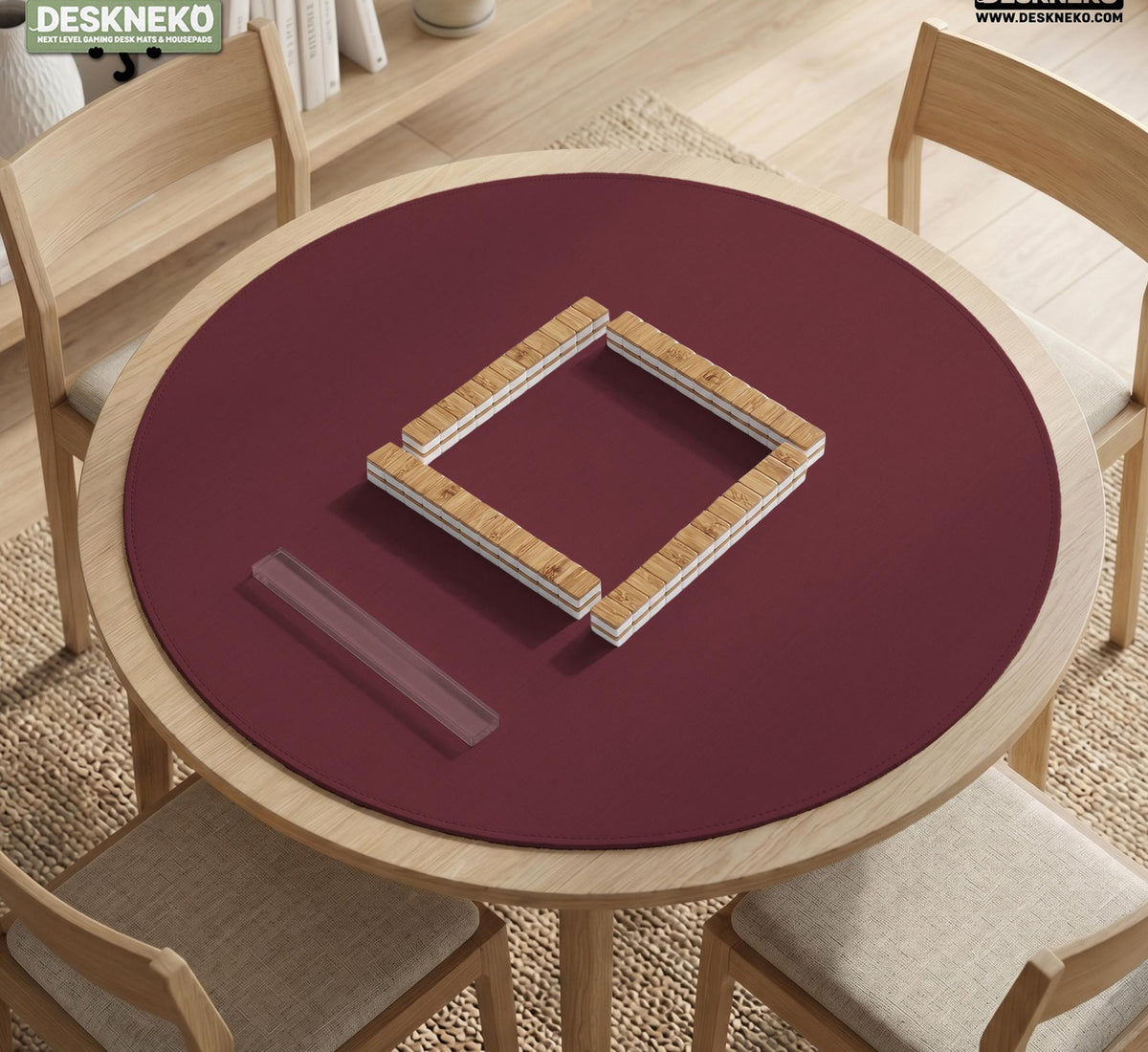 Plain burgundy square mahjong mat with scalloped edges on a white background.