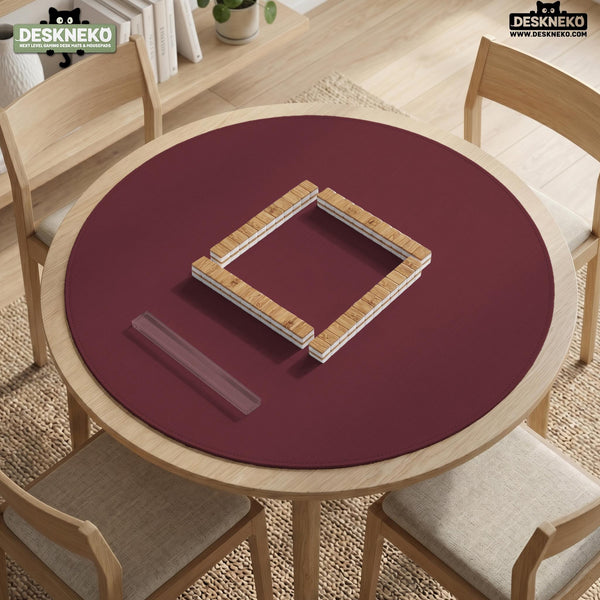 Plain burgundy square mahjong mat with scalloped edges on a white background.