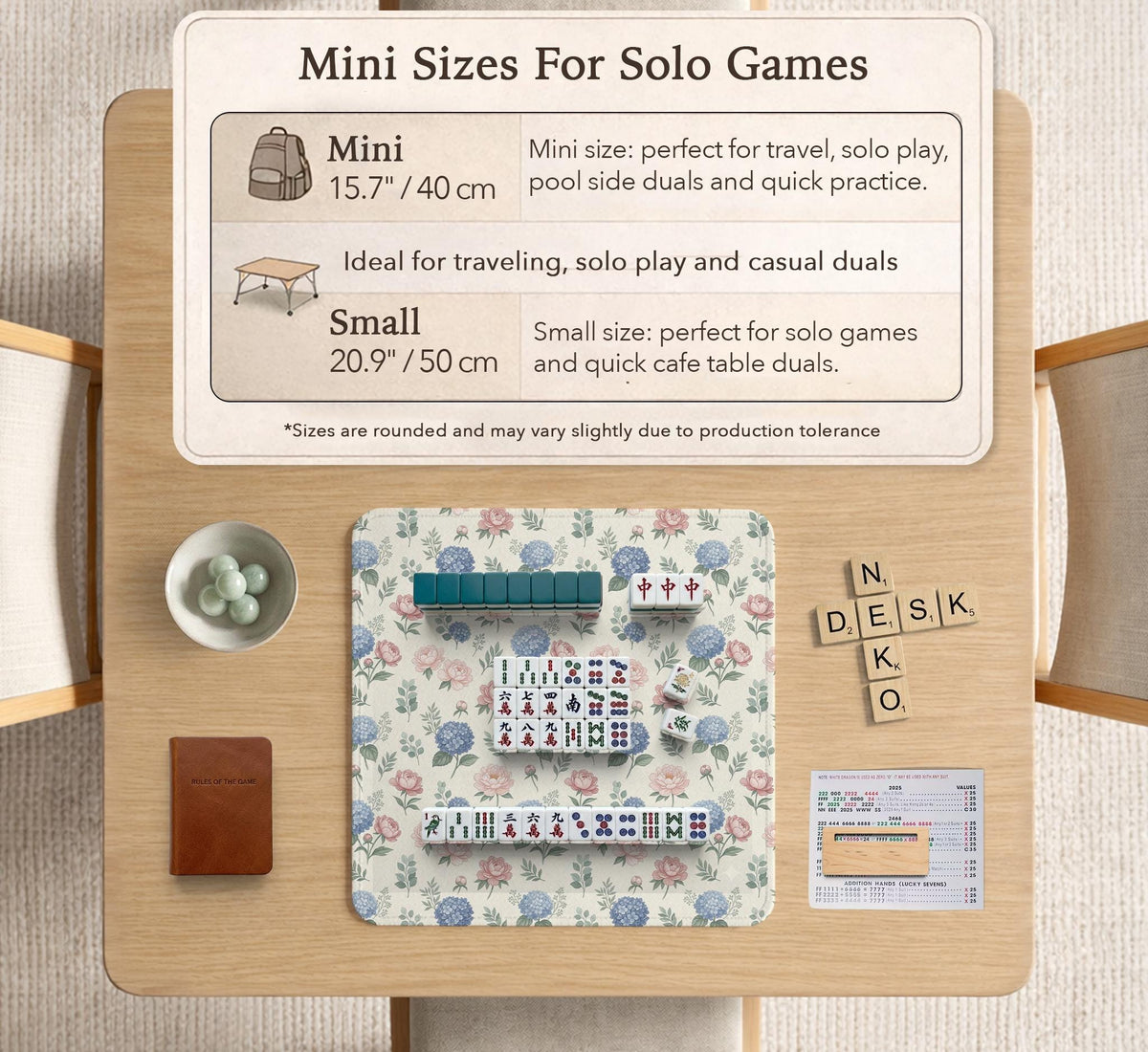 Pink floral mahjong table mat with peonies, blue hydrangeas, sage green leaves, and an ivory background.