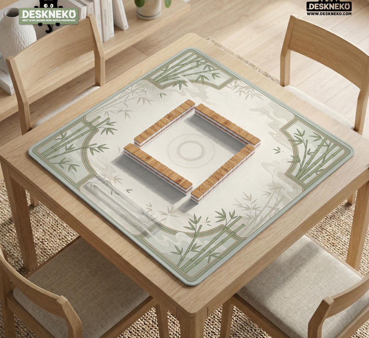 Square mahjong table mat with a pale cream center and green bamboo chinoiserie corners and border.