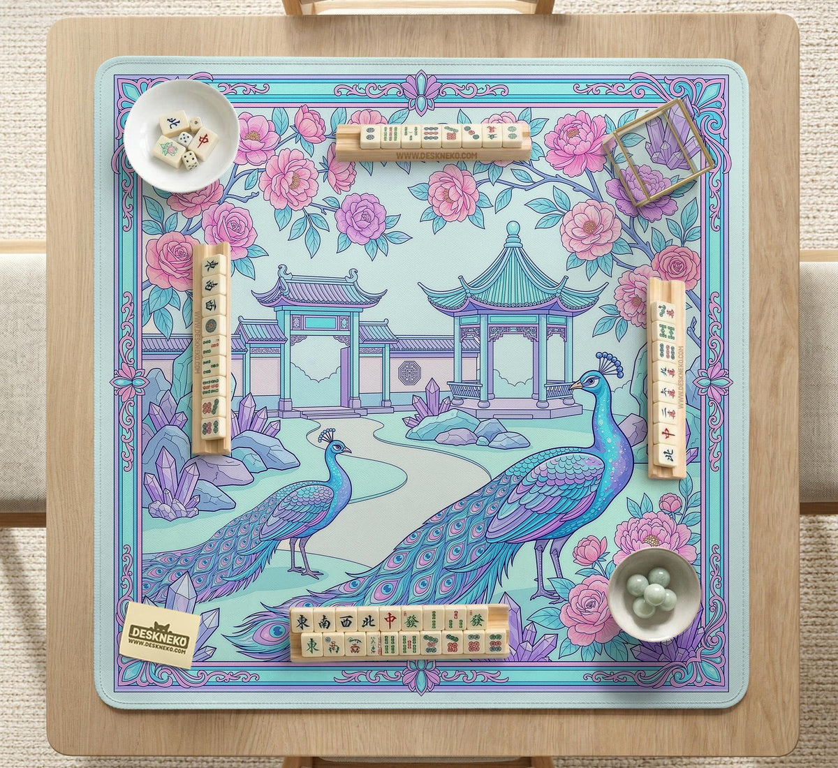 Pastel aqua mahjong table mat with peacock birds, pink flowers, pavilion details, and ornate floral linework.
