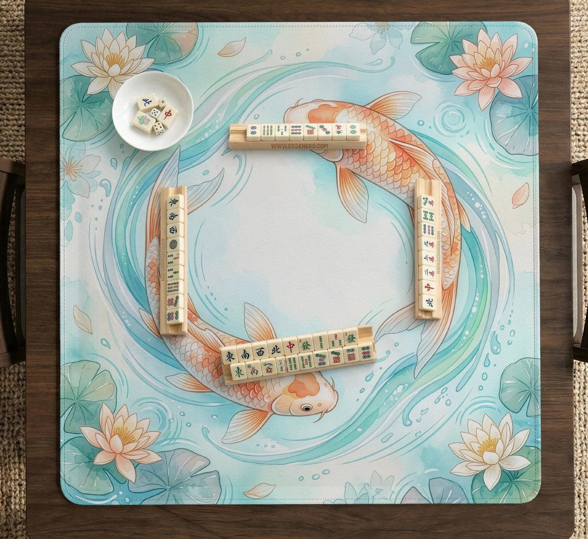 Pastel aqua square mahjong mat with orange koi fish, lotus flowers, lily pads, and flowing water lines.