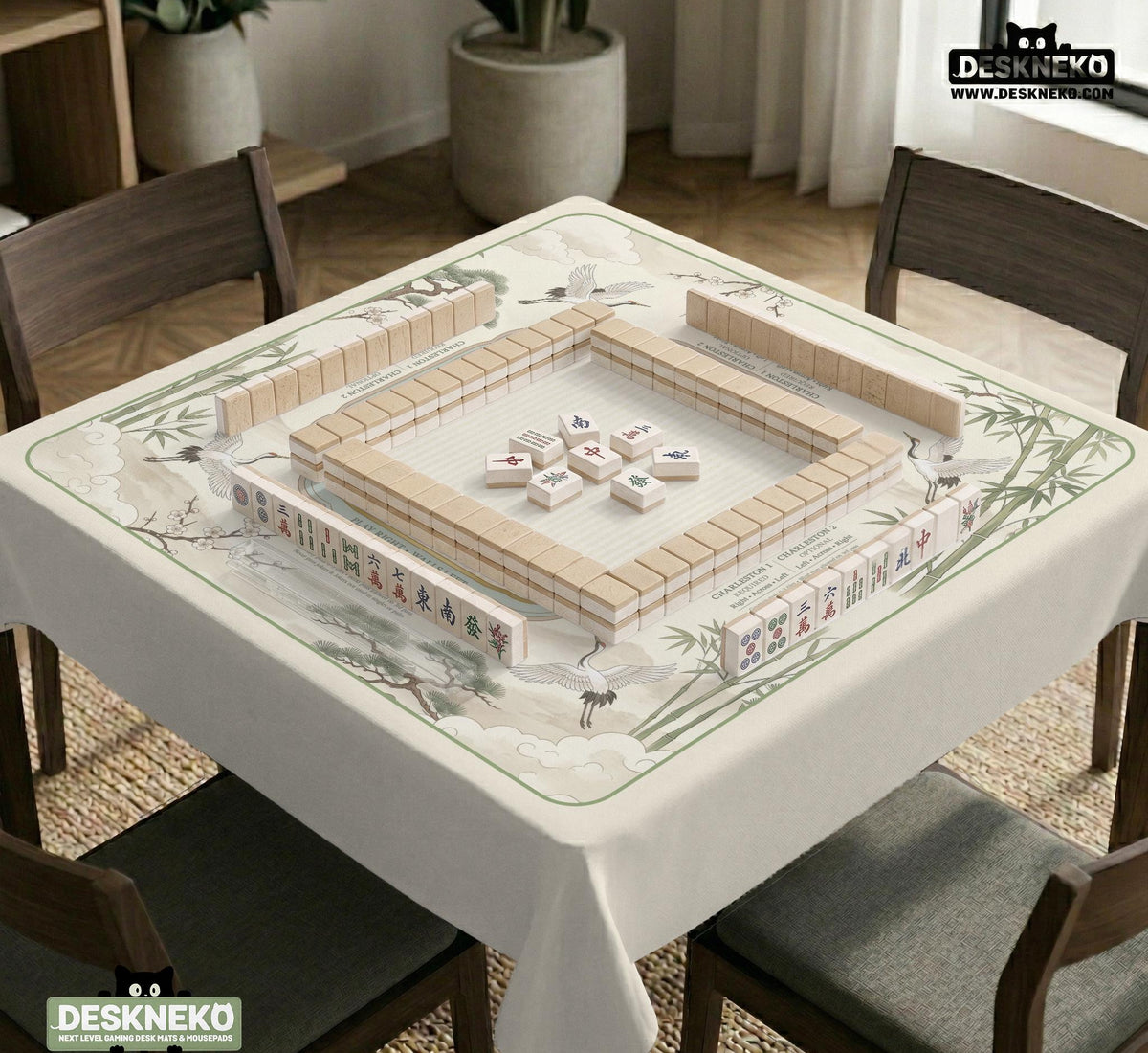 Sage green scalloped mahjong mat with bamboo, crane, and blossom illustration and printed rules around the border.