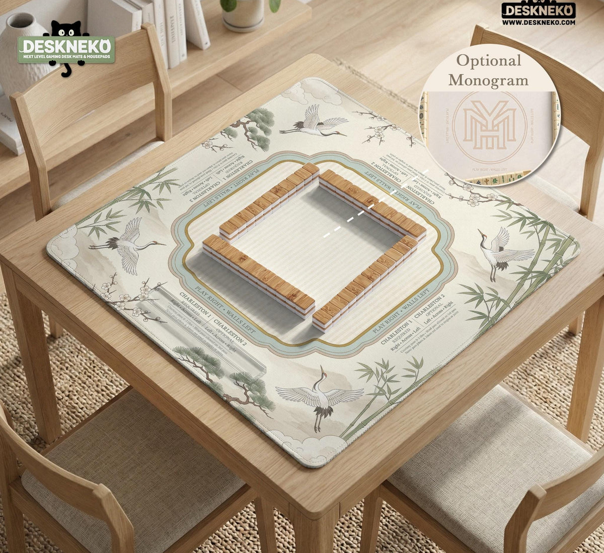 Sage green scalloped mahjong mat with bamboo, crane, and blossom illustration and printed rules around the border.