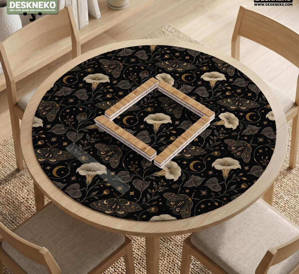 Black square mahjong mat with moths, moonflowers, crescent moons, and scattered stars in a celestial floral pattern.
