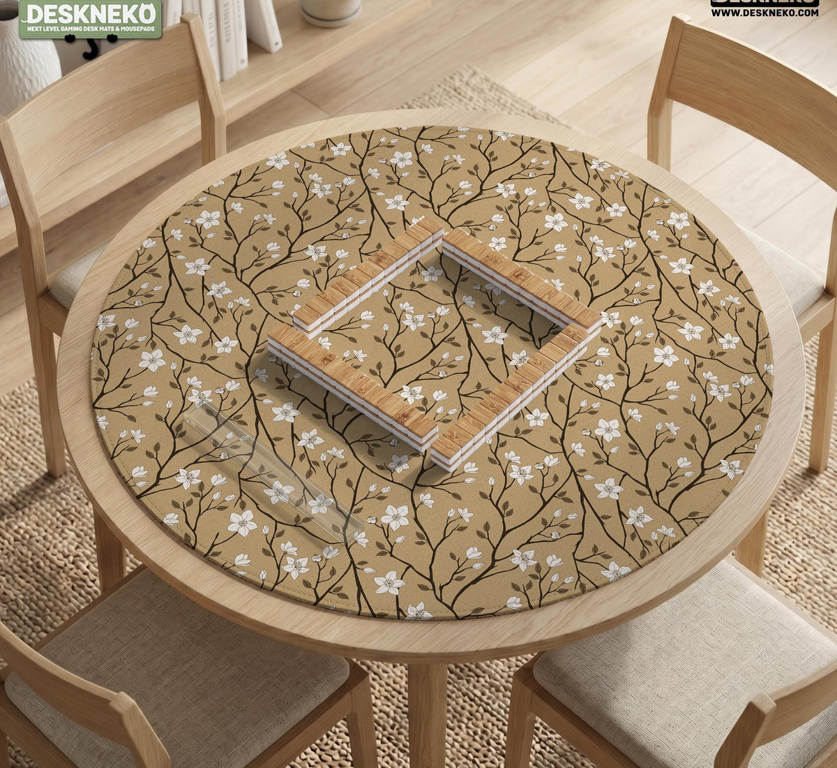 Beige mahjong mat with a white blossom branch floral pattern on a neutral background.