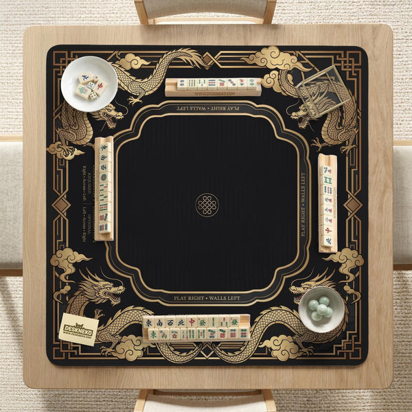 Black mahjong mat with gold dragon artwork, a scalloped edge, and printed Mahjong rules on the surface.