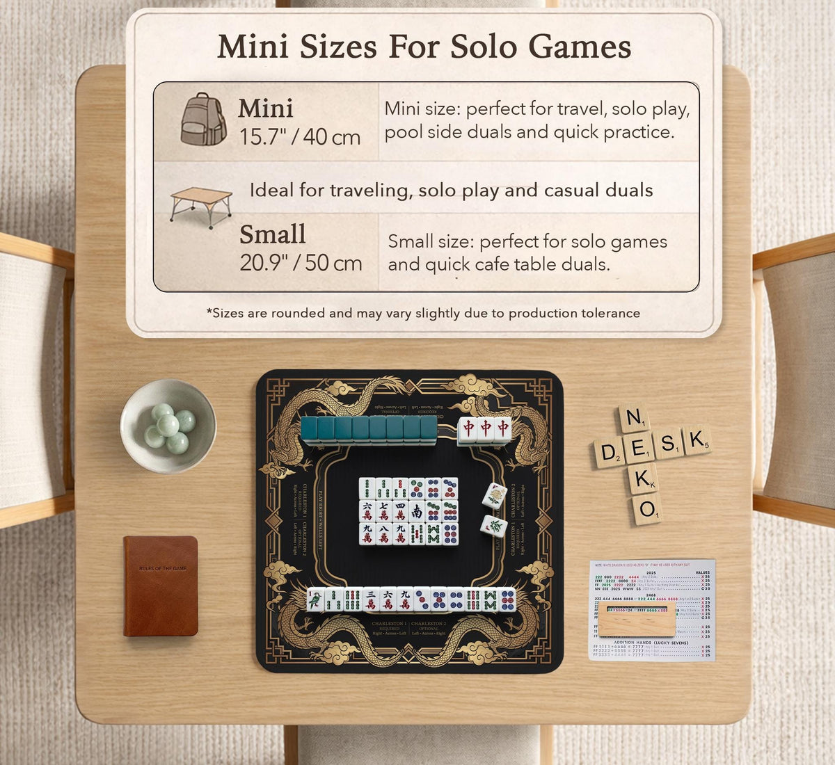 Black mahjong mat with gold dragon artwork, a scalloped edge, and printed Mahjong rules on the surface.