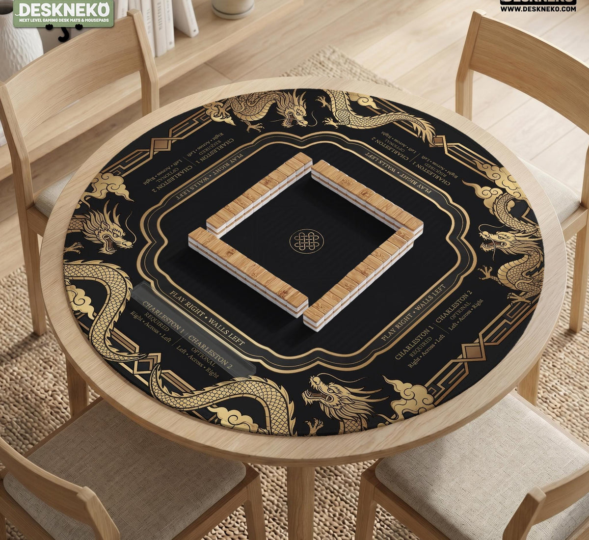 Black mahjong mat with gold dragon artwork, a scalloped edge, and printed Mahjong rules on the surface.