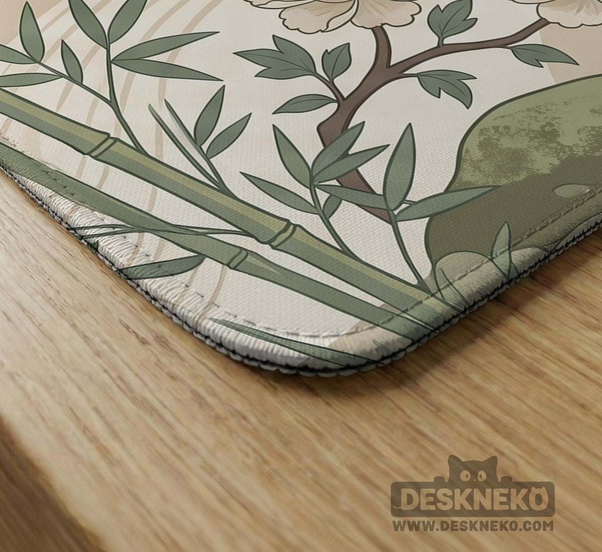 Square mahjong mat with a cream background, sage green cranes, bamboo leaves, peony branches, stones, and thin linework.
