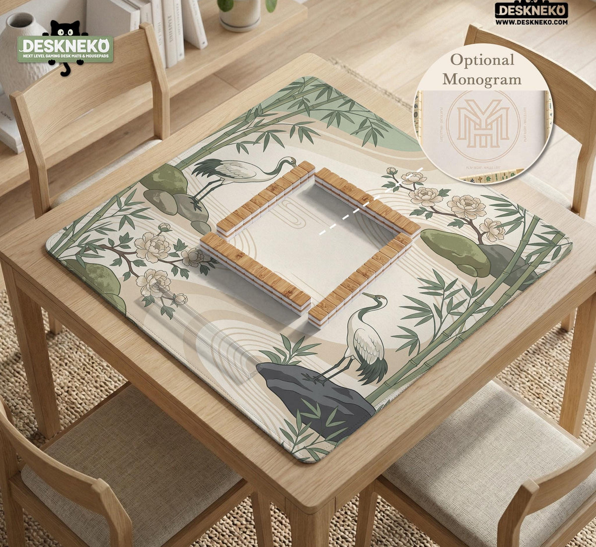 Square mahjong mat with a cream background, sage green cranes, bamboo leaves, peony branches, stones, and thin linework.