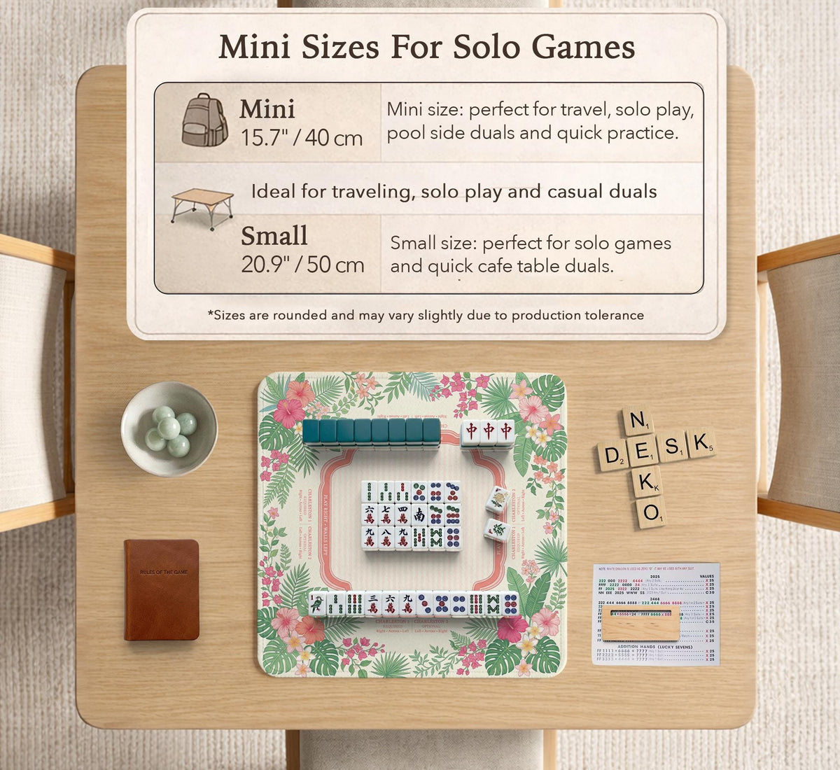 Coral tropical floral mahjong mat with hibiscus flowers, palm leaves, cream sections, and a scalloped edge.