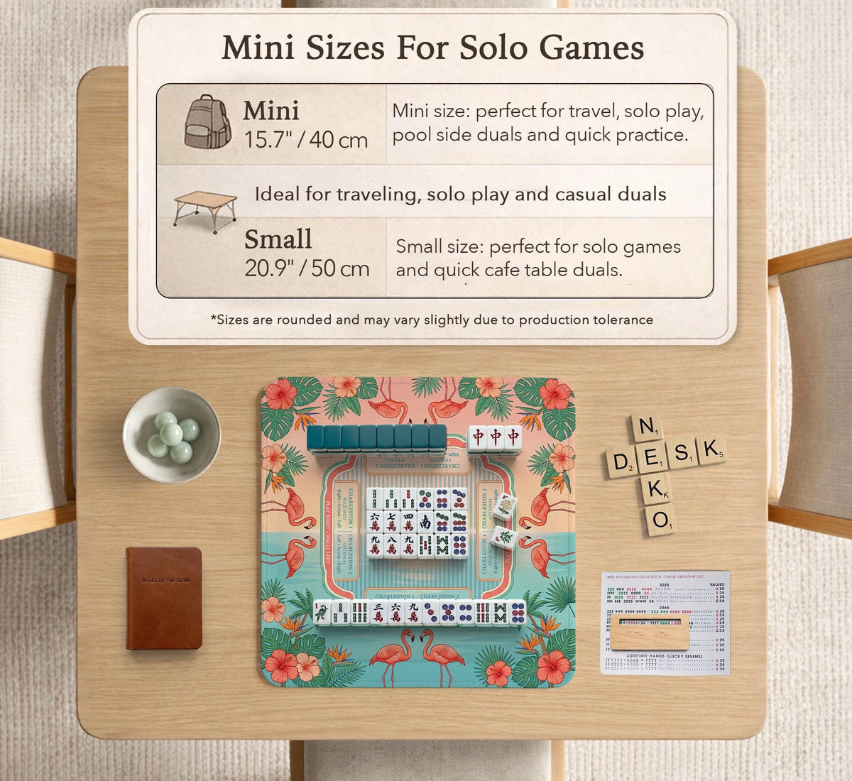 Pink mahjong mat with flamingos, palm leaves, hibiscus flowers, and aqua tropical background.