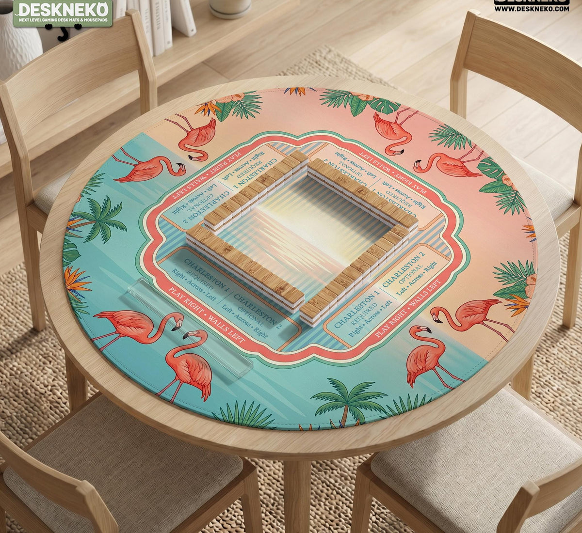 Pink mahjong mat with flamingos, palm leaves, hibiscus flowers, and aqua tropical background.